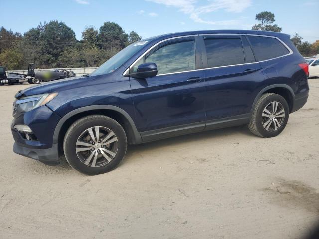 HONDA PILOT EXL 2016 with VIN 5FNYF6H57GB128493 - Photo from auction