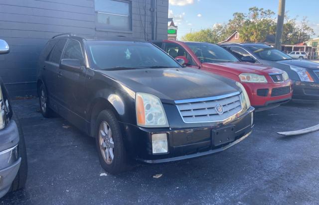 CADILLAC SRX 2009 with VIN 1GYEE637890103077 - Photo from auction