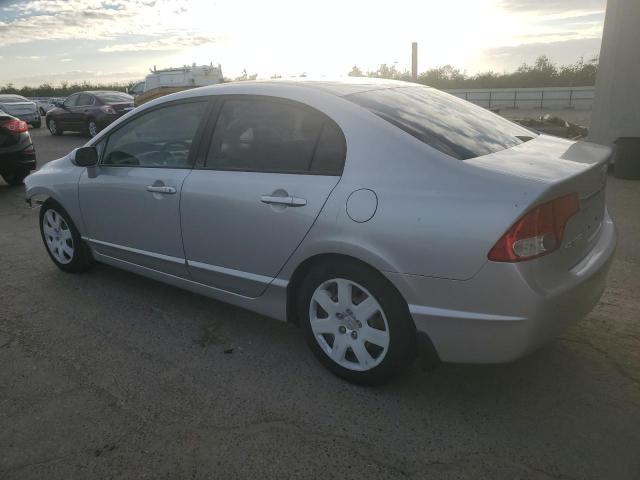 Photo 2 from auction – 2011 HONDA CIVIC LX with VIN 19XFA1F57BE046001