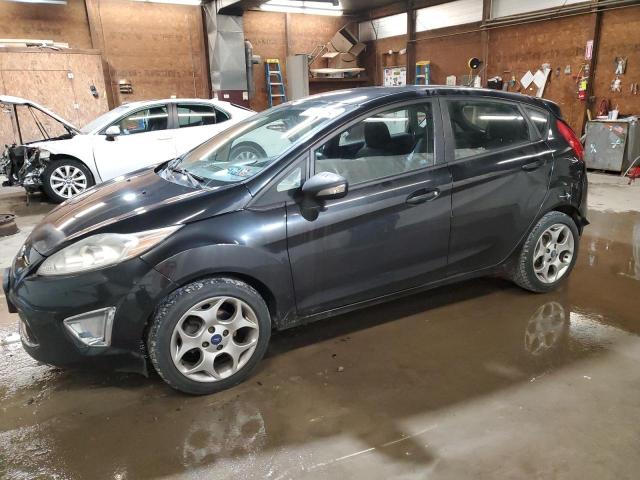 FORD FIESTA SES 2011 with VIN 3FADP4FJ0BM223052 - Photo from auction