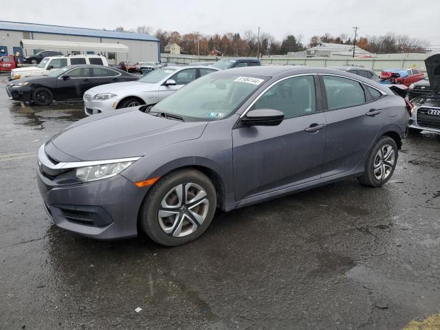 Photo 1 from auction – 2018 HONDA CIVIC LX with VIN 2HGFC2F58JH602031