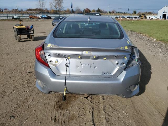 Photo 6 from auction – 2017 HONDA CIVIC EX with VIN 19XFC2F73HE010171