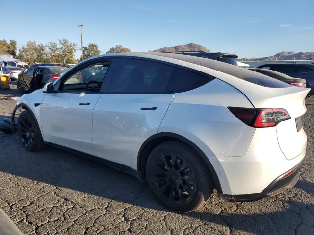 Photo 2 from auction – 2021 TESLA MODEL Y with VIN 5YJYGAEEXMF217622