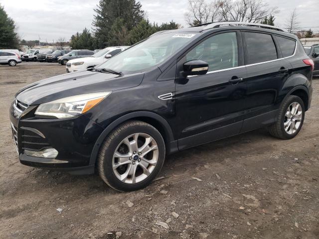 FORD ESCAPE TIT 2016 with VIN 1FMCU9JX8GUC48593 - Photo from auction