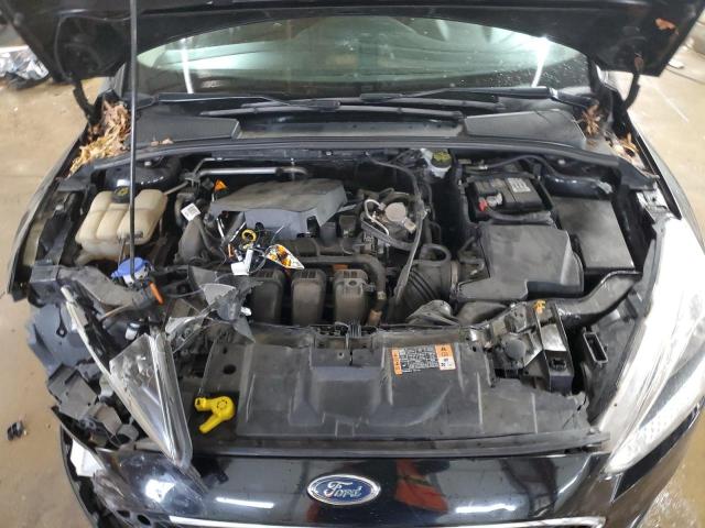 Photo 11 from auction – 2016 FORD FOCUS SE with VIN 1FADP3F29GL377626