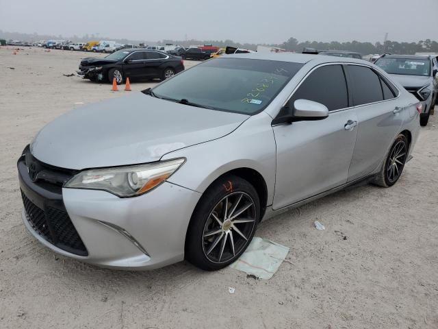 TOYOTA CAMRY LE 2017 with VIN 4T1BF1FKXHU339063 - Photo from auction