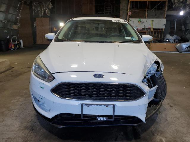 Снимка 5 от търг – 2015 FORD FOCUS SE с VIN 1FADP3F26FL262383