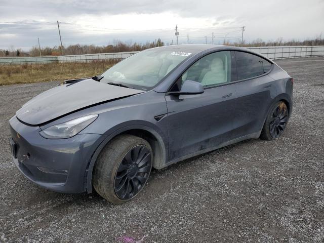 TESLA MODEL Y 2022 с VIN 7SAYGDEF0NF314004 - Фото с аукциона