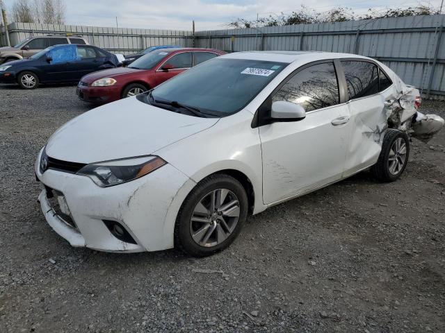 TOYOTA COROLLA EC 2014 مع رقم تعريف المركبة 5YFBPRHE3EP109851 - صورة من المزاد