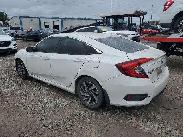 Photo 2 from auction – 2018 HONDA CIVIC EX with VIN 19XFC2F74JE015062