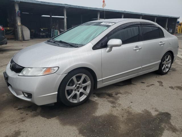 HONDA CIVIC LX 2011 with VIN 2HGFA1F53BH309462 - Photo from auction