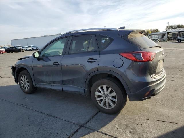 Photo 2 from auction – 2014 MAZDA CX-5 TOURI with VIN JM3KE2CY8E0315196