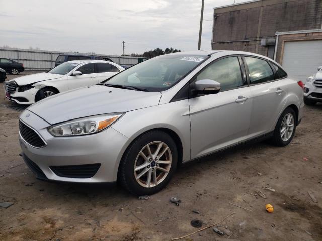 FORD FOCUS SE 2015 with VIN 1FADP3F21FL362729 - Photo from auction