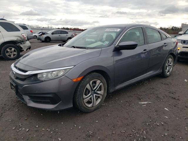 HONDA CIVIC LX 2017 with VIN 19XFC2F52HE053530 - Photo from auction