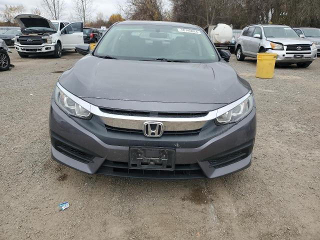 Photo 5 from auction – 2016 HONDA CIVIC LX with VIN 2HGFC2F54GH013129