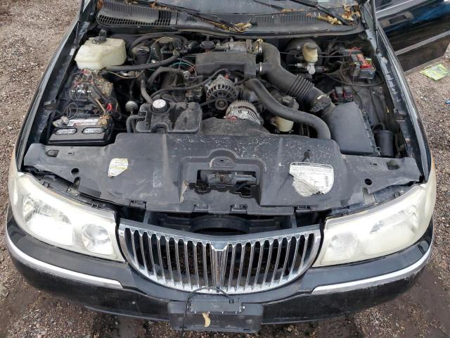 Photo 11 from auction – 2000 LINCOLN TOWN CAR E with VIN 1L1FM81W3YY771708