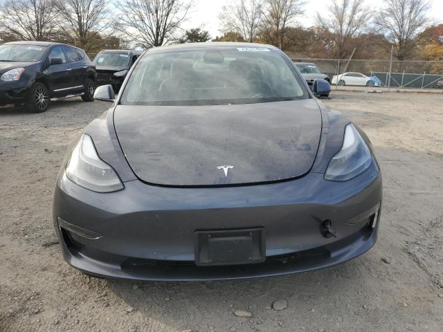 Photo 5 from auction – 2021 TESLA MODEL 3 with VIN 5YJ3E1EB4MF869335