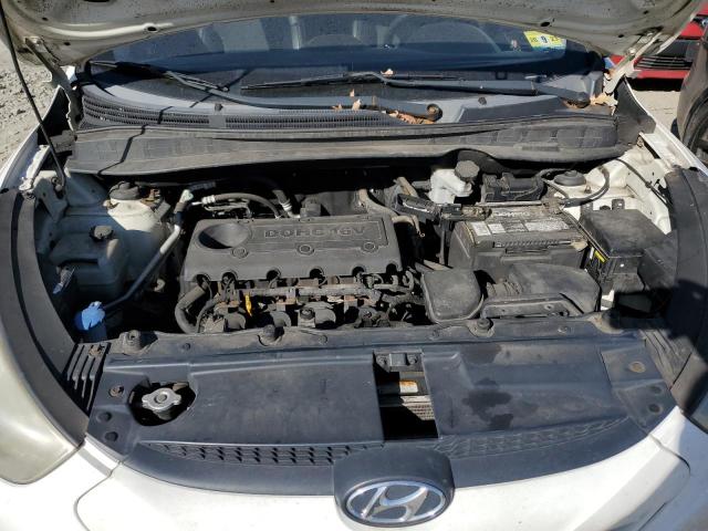 Photo 12 from auction – 2010 HYUNDAI TUCSON with VIN KM8JUCAC7AU047079