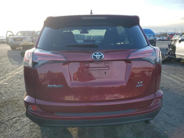 Photo 6 from auction – 2018 TOYOTA RAV4 LE with VIN 2T3BFREV5JW711769