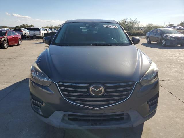 Photo 5 from auction – 2016 MAZDA CX-5 GT with VIN JM3KE2DY9G0861197