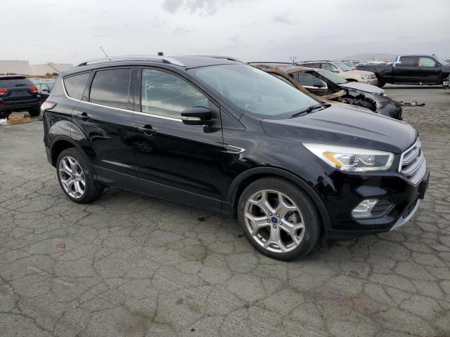 Photo 4 from auction – 2017 FORD ESCAPE TIT with VIN 1FMCU0J92HUC51441