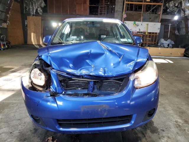 Photo 5 from auction – 2013 SUZUKI SX4 LE with VIN JS2YC5A36D6102850