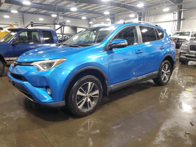 TOYOTA RAV4 XLE 2016 with VIN 2T3RFREV1GW504142 - Photo from auction
