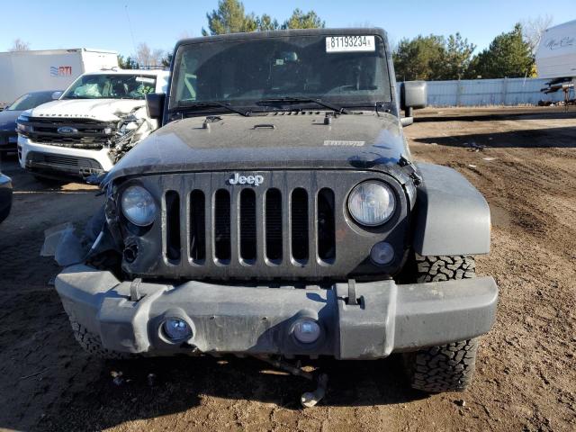 Photo 5 from auction – 2015 JEEP WRANGLER U with VIN 1C4BJWFG9FL763512