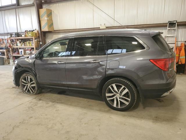 Photo 2 from auction – 2018 HONDA PILOT TOUR with VIN 5FNYF6H99JB504203