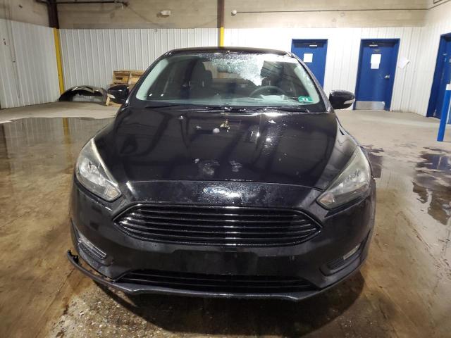 Photo 5 from auction – 2016 FORD FOCUS SE with VIN 1FADP3FE2GL298440