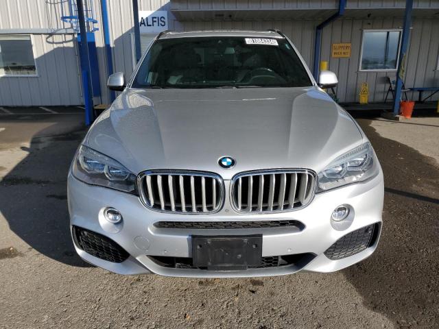 Photo 5 from auction – 2016 BMW X5 XDRIVE5 with VIN 5UXKR6C57G0J82099