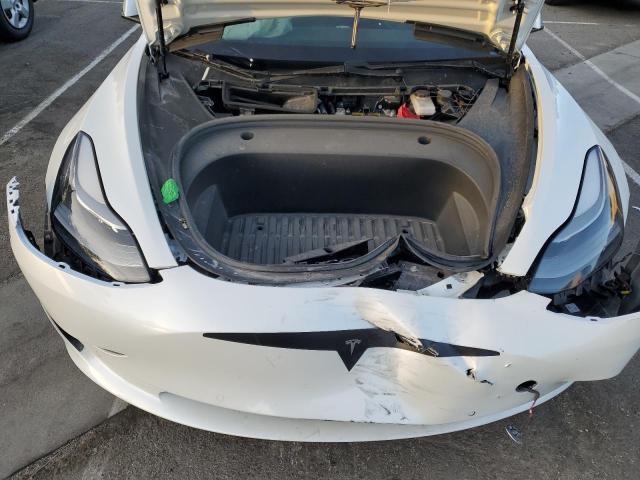 Photo 11 from auction – 2021 TESLA MODEL 3 with VIN 5YJ3E1EA4MF006414