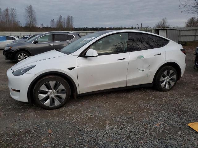 TESLA MODEL Y 2023 with VIN 7SAYGAEE5PF741980 - Photo from auction