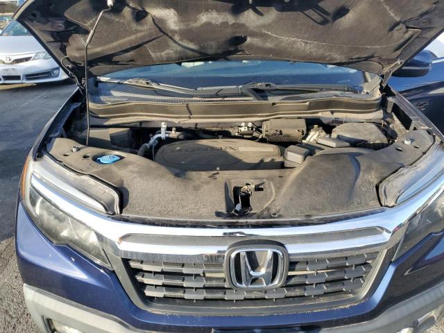 Photo 12 from auction – 2017 HONDA RIDGELINE with VIN 5FPYK3F55HB017656