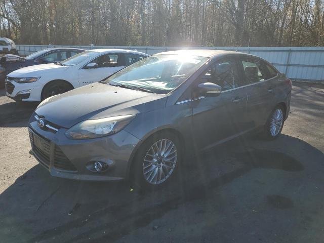 FORD FOCUS TITA 2014 with VIN 1FADP3J2XEL232728 - Photo from auction