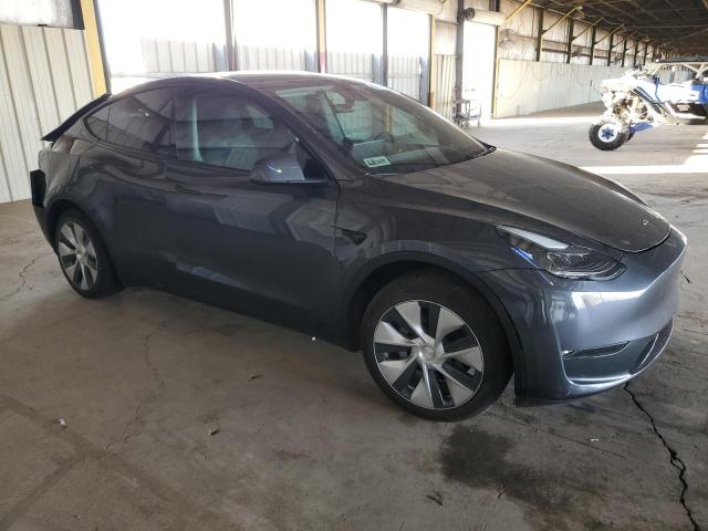 Photo 4 from auction – 2023 TESLA MODEL Y with VIN 7SAYGDEE6PF882588