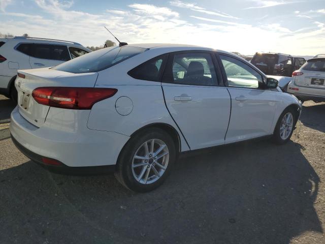 Photo 3 from auction – 2015 FORD FOCUS SE with VIN 1FADP3F21FL365193