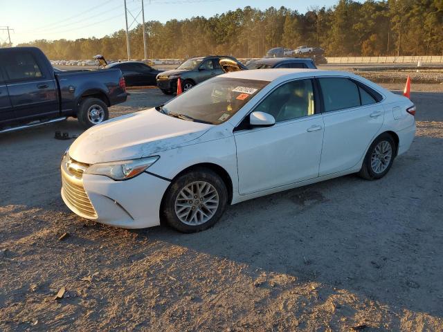 TOYOTA CAMRY LE 2016 with VIN 4T1BF1FK1GU117879 - Photo from auction