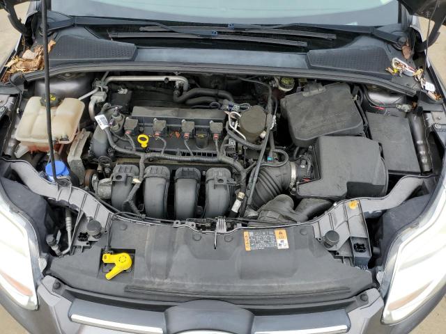 Photo 11 from auction – 2014 FORD FOCUS SE with VIN 1FADP3F29EL390504