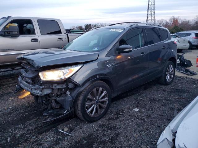 FORD ESCAPE TIT 2017 with VIN 1FMCU9JD8HUD02885 - Photo from auction