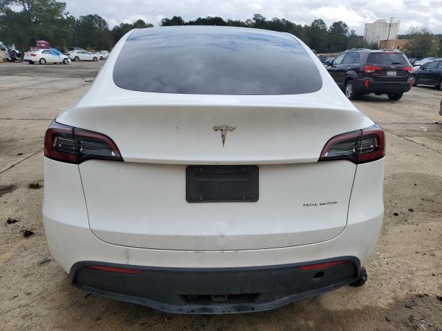 Photo 6 from auction – 2023 TESLA MODEL Y with VIN 7SAYGAEE0PF704030