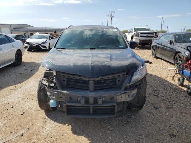 Photo 5 from auction – 2015 LINCOLN MKC with VIN 5LMCJ2A98FUJ25664