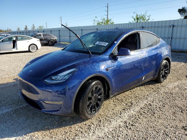 TESLA MODEL Y 2022 with VIN 7SAYGDEE4NF381860 - Photo from auction