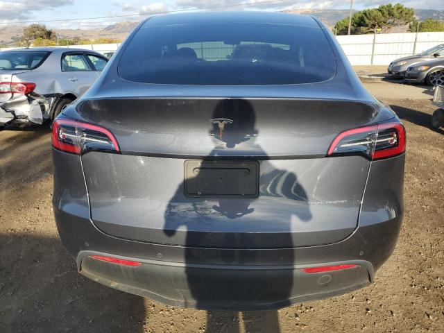Photo 6 from auction – 2022 TESLA MODEL Y with VIN 7SAYGDEE7NF548650