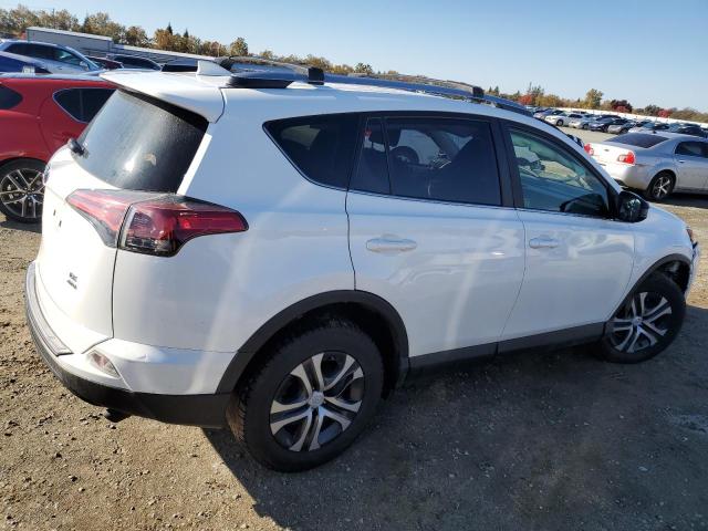 Photo 3 from auction – 2017 TOYOTA RAV4 LE with VIN JTMBFREV4HJ716874