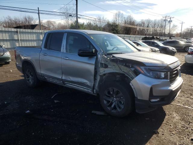 Photo 4 from auction – 2023 HONDA RIDGELINE with VIN 5FPYK3F10PB054271