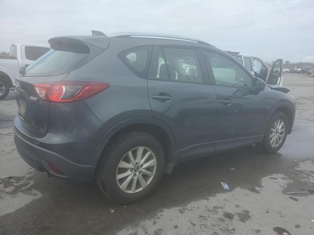Photo 3 from auction – 2014 MAZDA CX-5 SPORT with VIN JM3KE2BE1E0344739