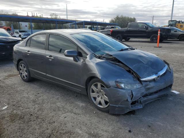 Снимка 4 от търг – 2011 HONDA CIVIC LX с VIN 19XFA1F56BE050167