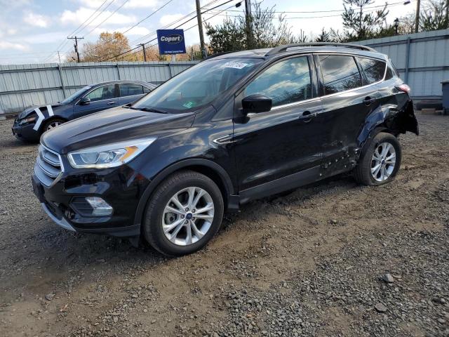 FORD ESCAPE SEL 2018 with VIN 1FMCU9HD6JUC98718 - Photo from auction