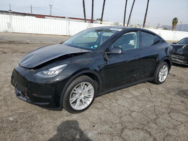 TESLA MODEL Y 2023 with VIN 7SAYGDEE6PA034305 - Photo from auction
